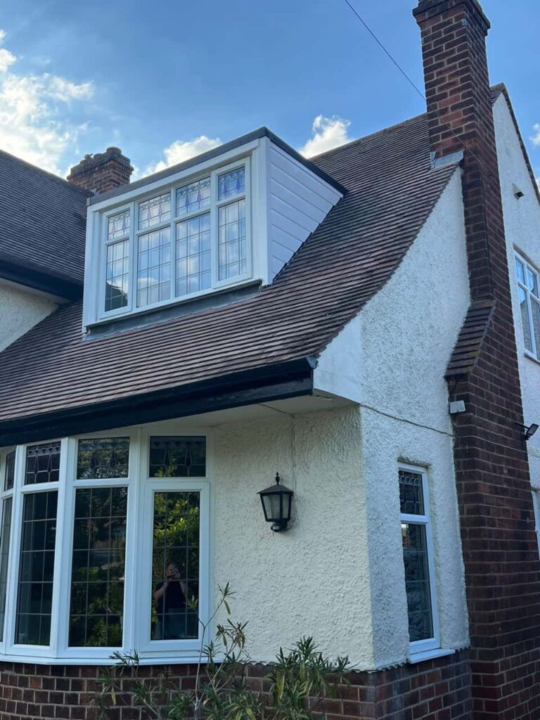 This is a photo of a dormer window which has just had some repairs carried out where the roof and the dormer meet. Works carried out by Arundel Roofing Repairs